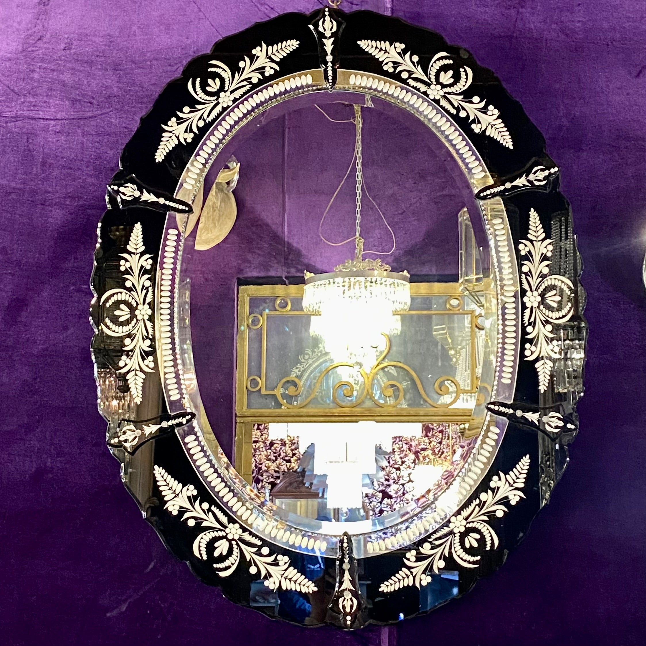 Unusual Oval Black Venetian Mirror