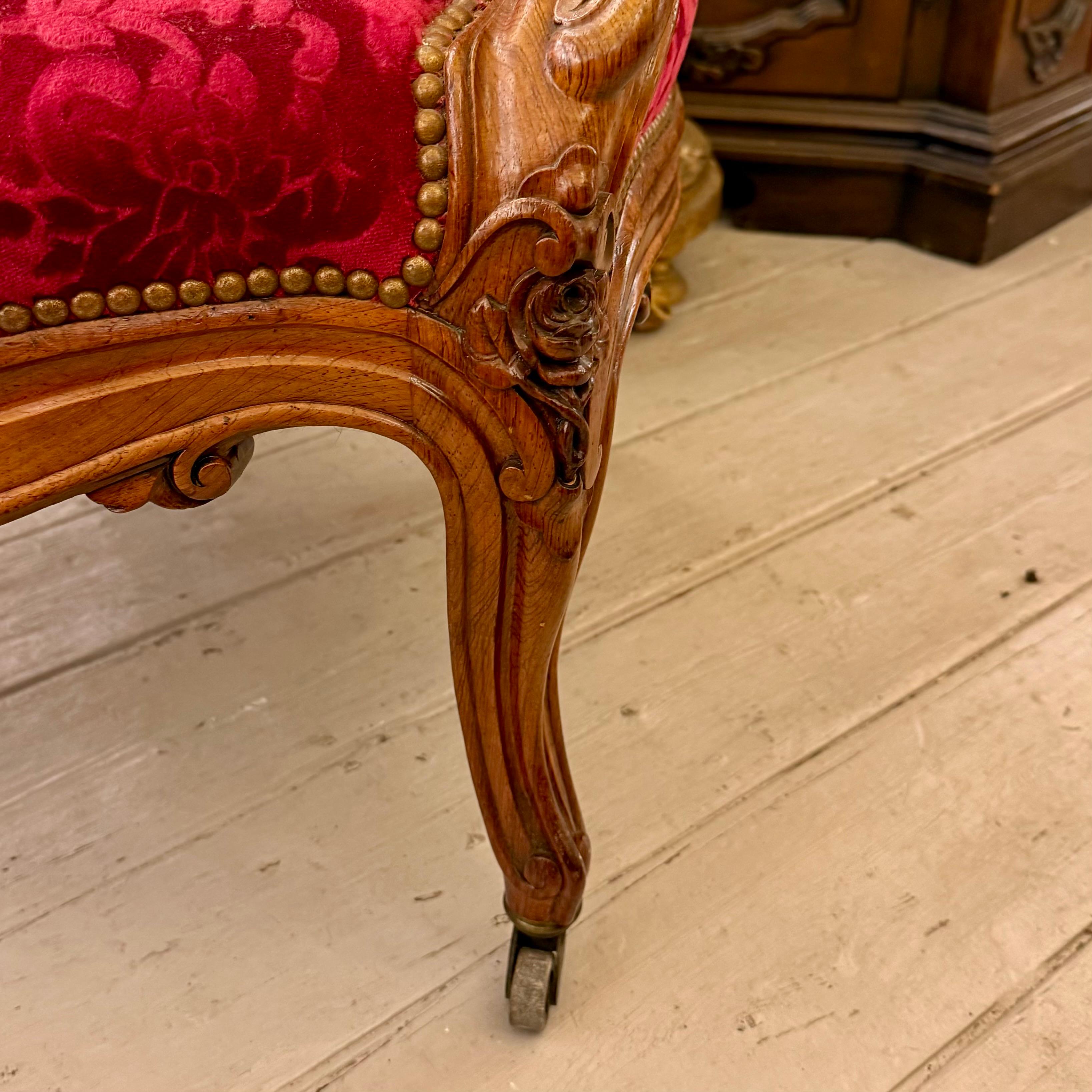 Antique Carved Oak Armchair with Luxurious Red Upholstery - SOLD