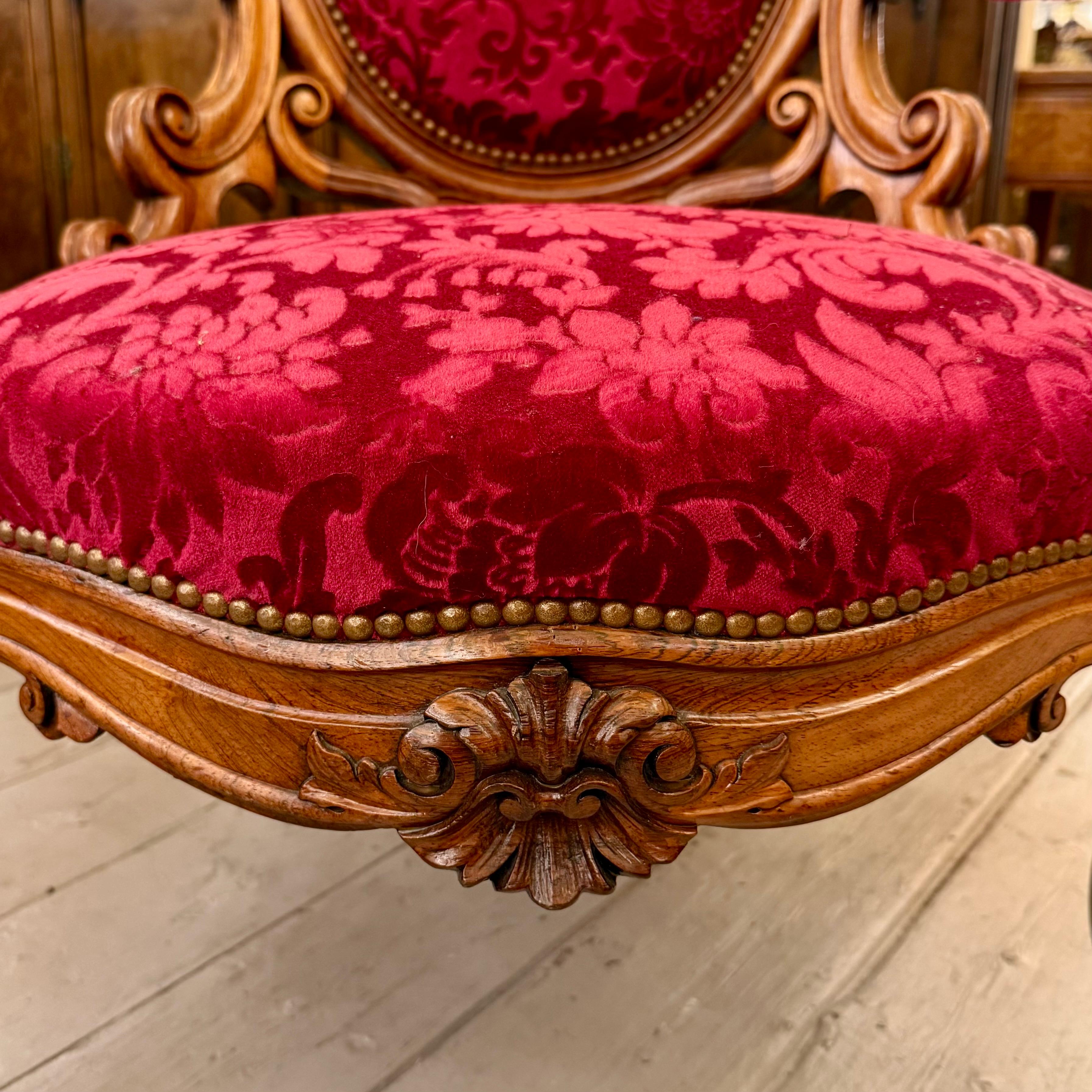 Antique Carved Oak Armchair with Luxurious Red Upholstery - SOLD