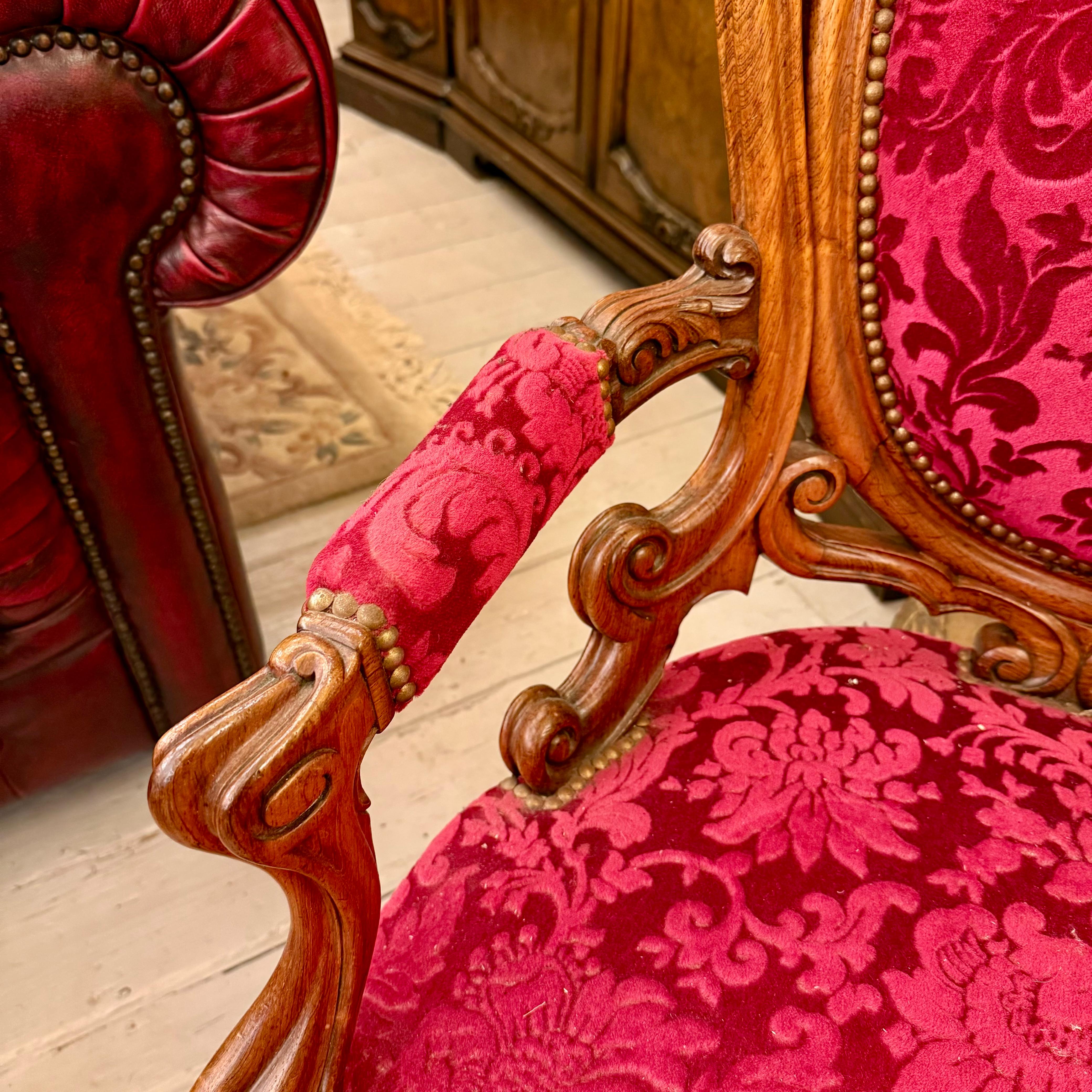 Antique Carved Oak Armchair with Luxurious Red Upholstery - SOLD