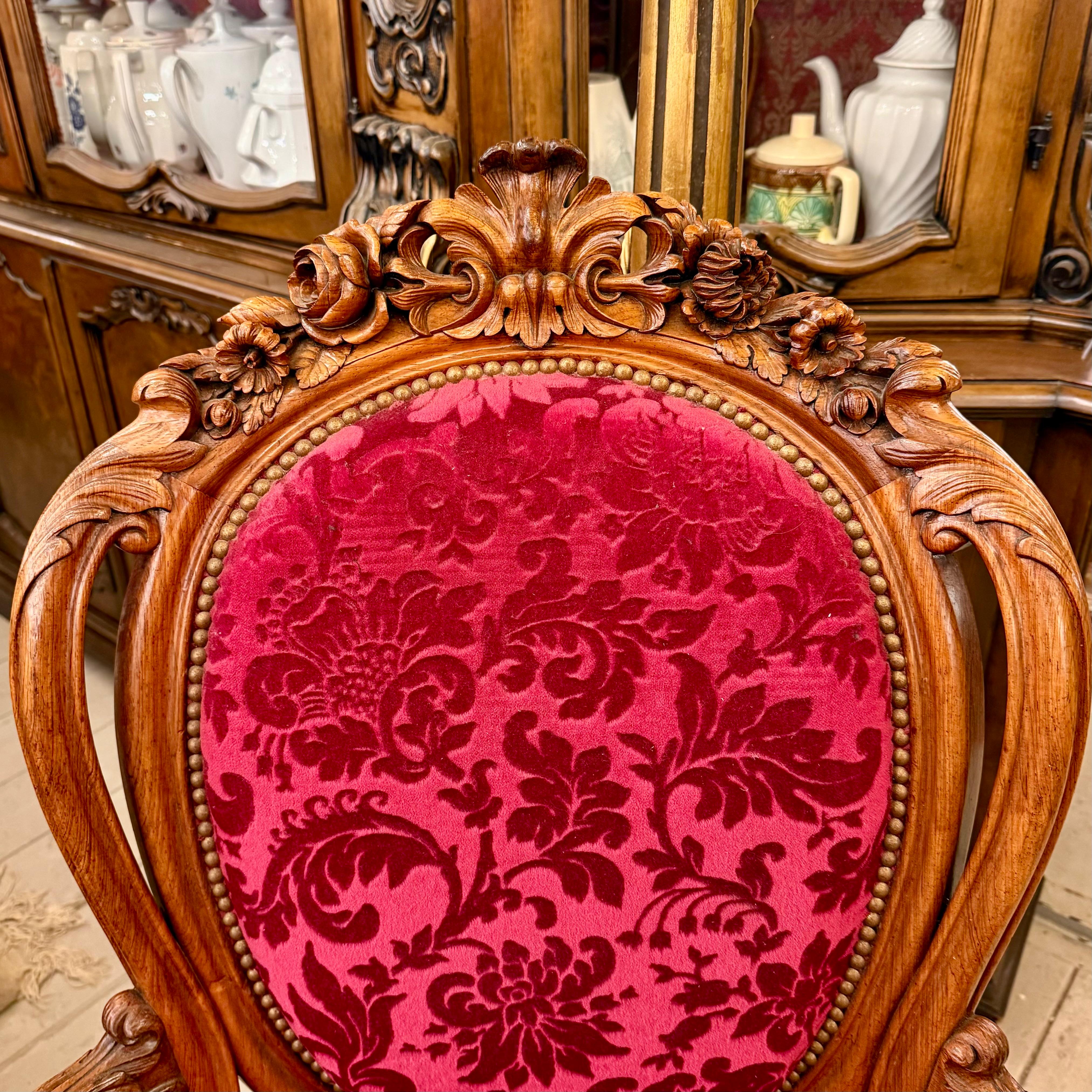 Antique Carved Oak Armchair with Luxurious Red Upholstery - SOLD