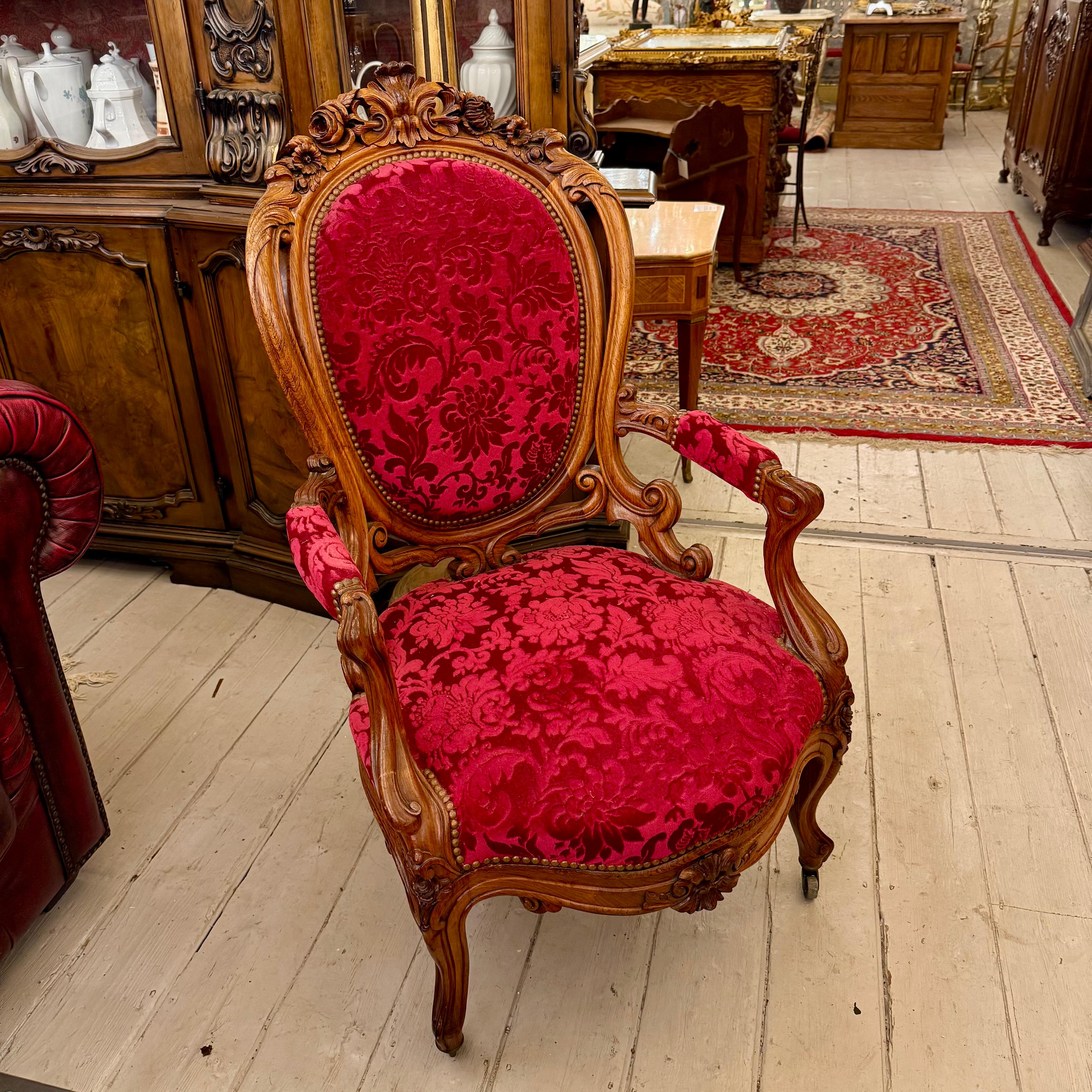 Antique Carved Oak Armchair with Luxurious Red Upholstery - SOLD