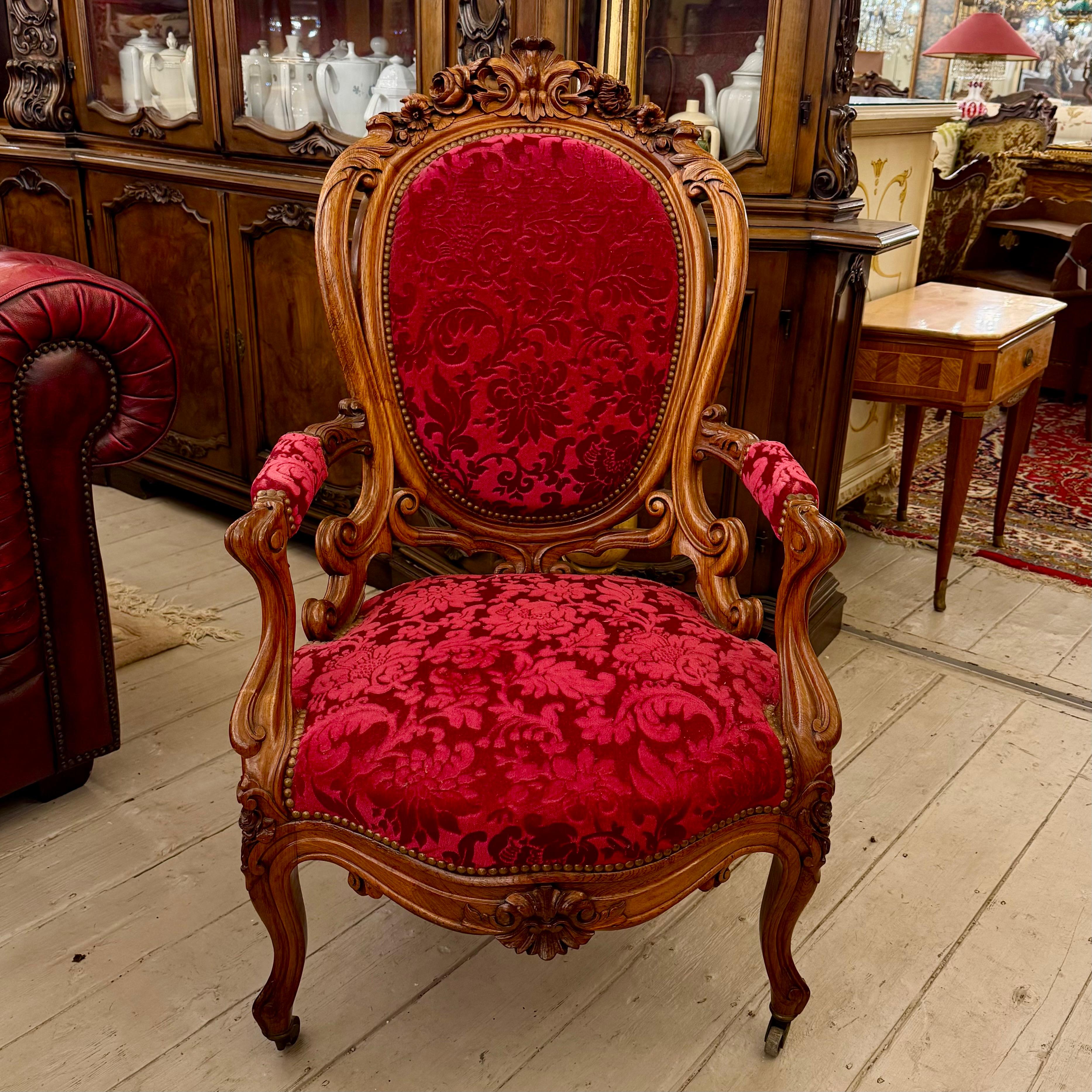 Antique Carved Oak Armchair with Luxurious Red Upholstery - SOLD