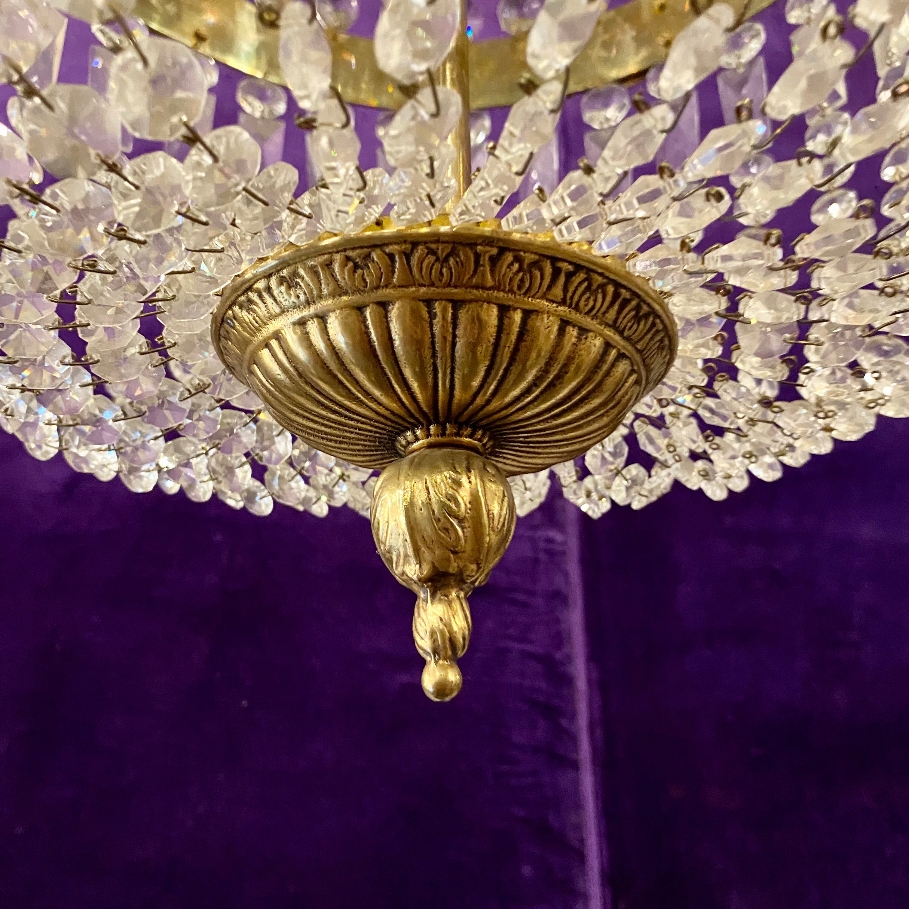 A Very Large Brass and Crystal Neoclassical Chandelier