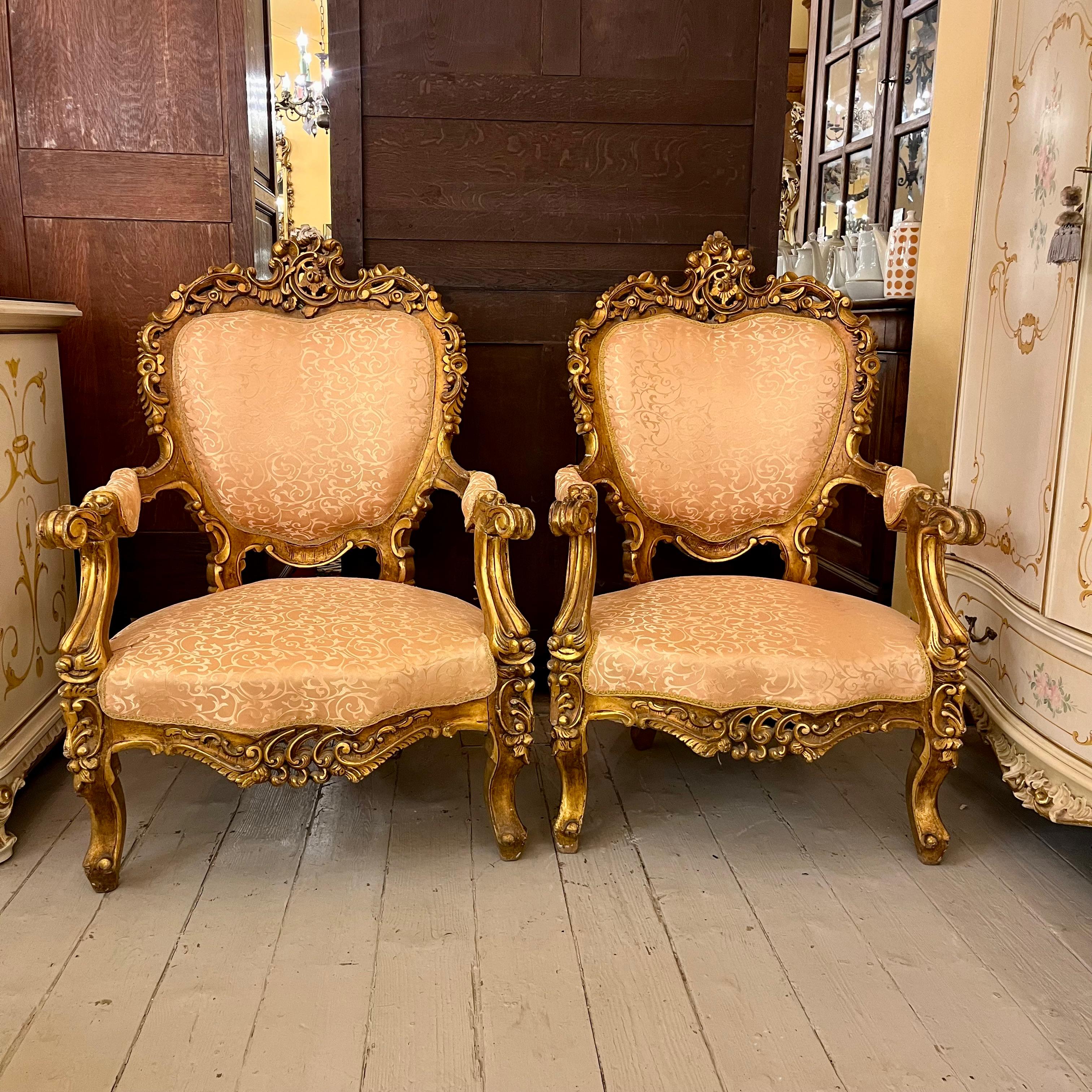 Grand Louis XV Giltwood Armchairs