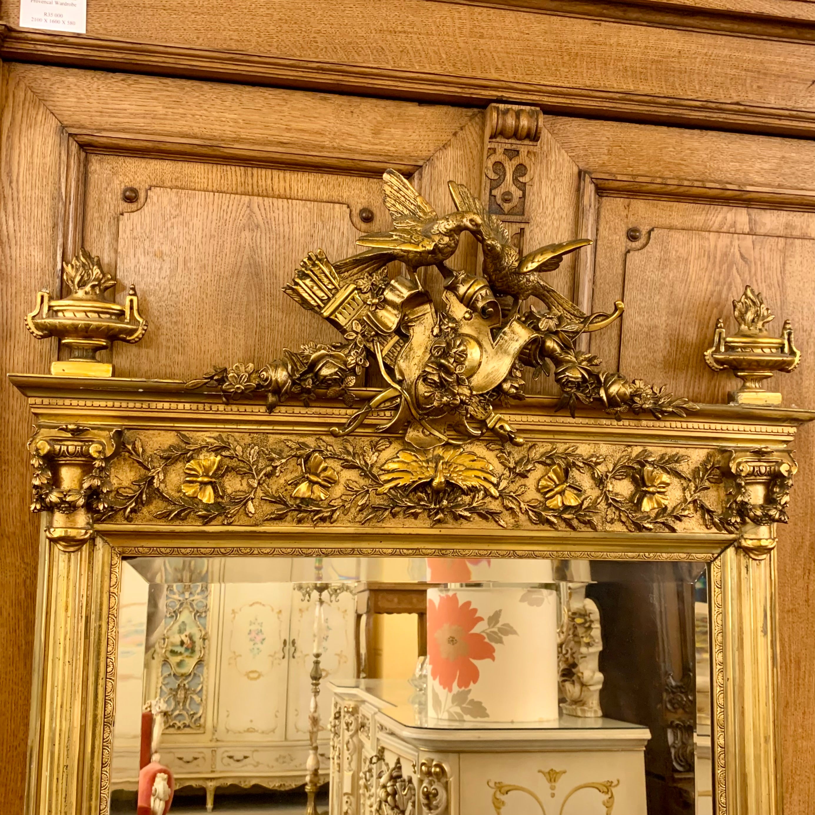 Antique Gilt & Bevelled Mirror with Intricate Carved Details