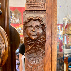 Large Dark Oak Breton Mirror with Lady Carving