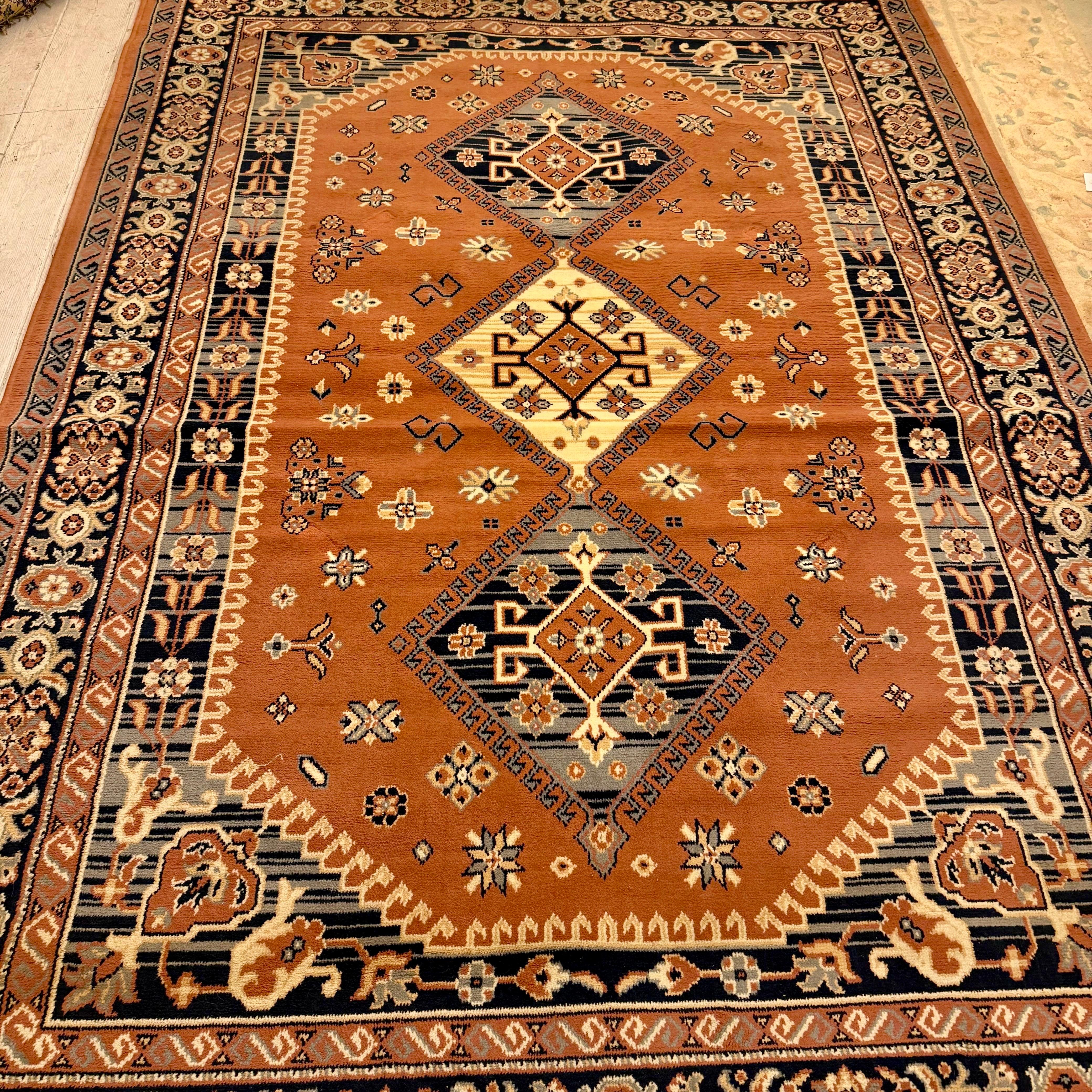 Geometric Rug in Rust and Navy Tones, Middle Eastern, c. Late 20th Century