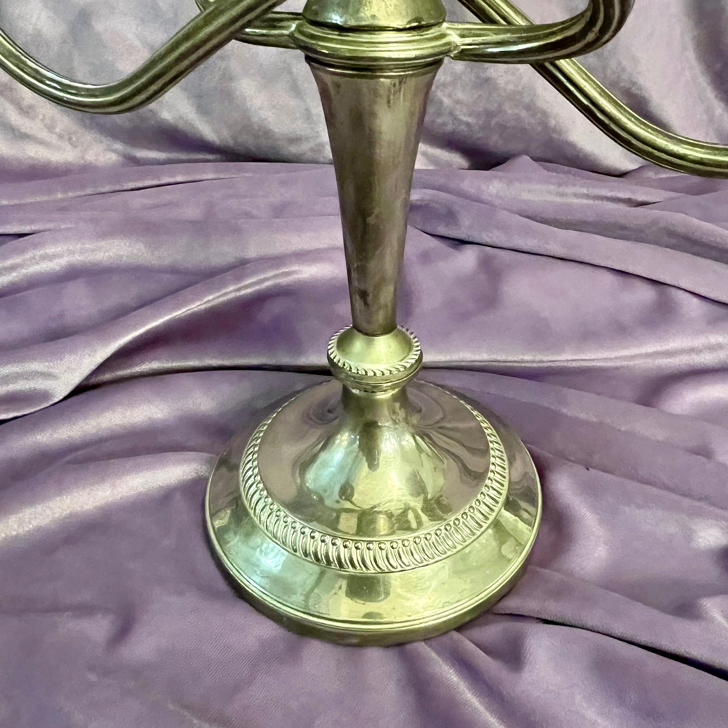 Near Pair of Antique Polished Nickel Candelabras