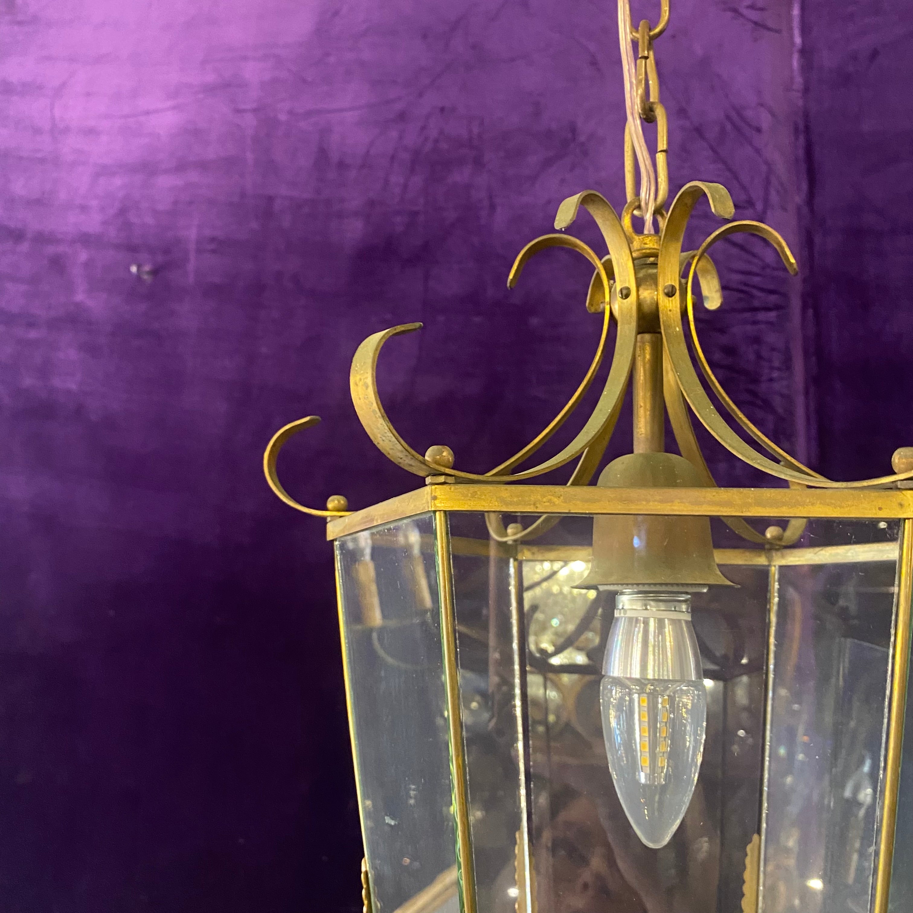 Simplistic old brass chandelier