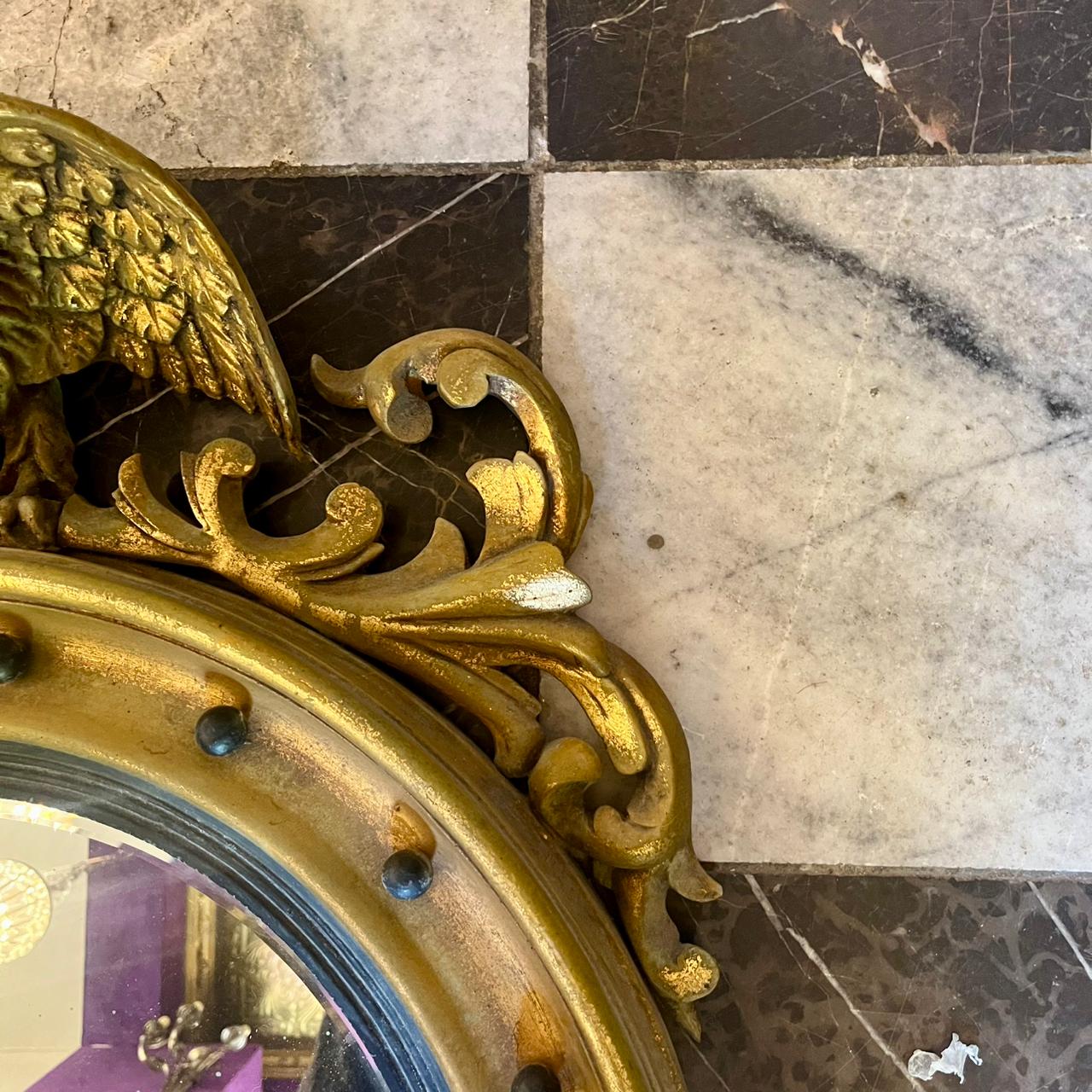 Vintage Gold Round Mirror Adorned with an Eagle
