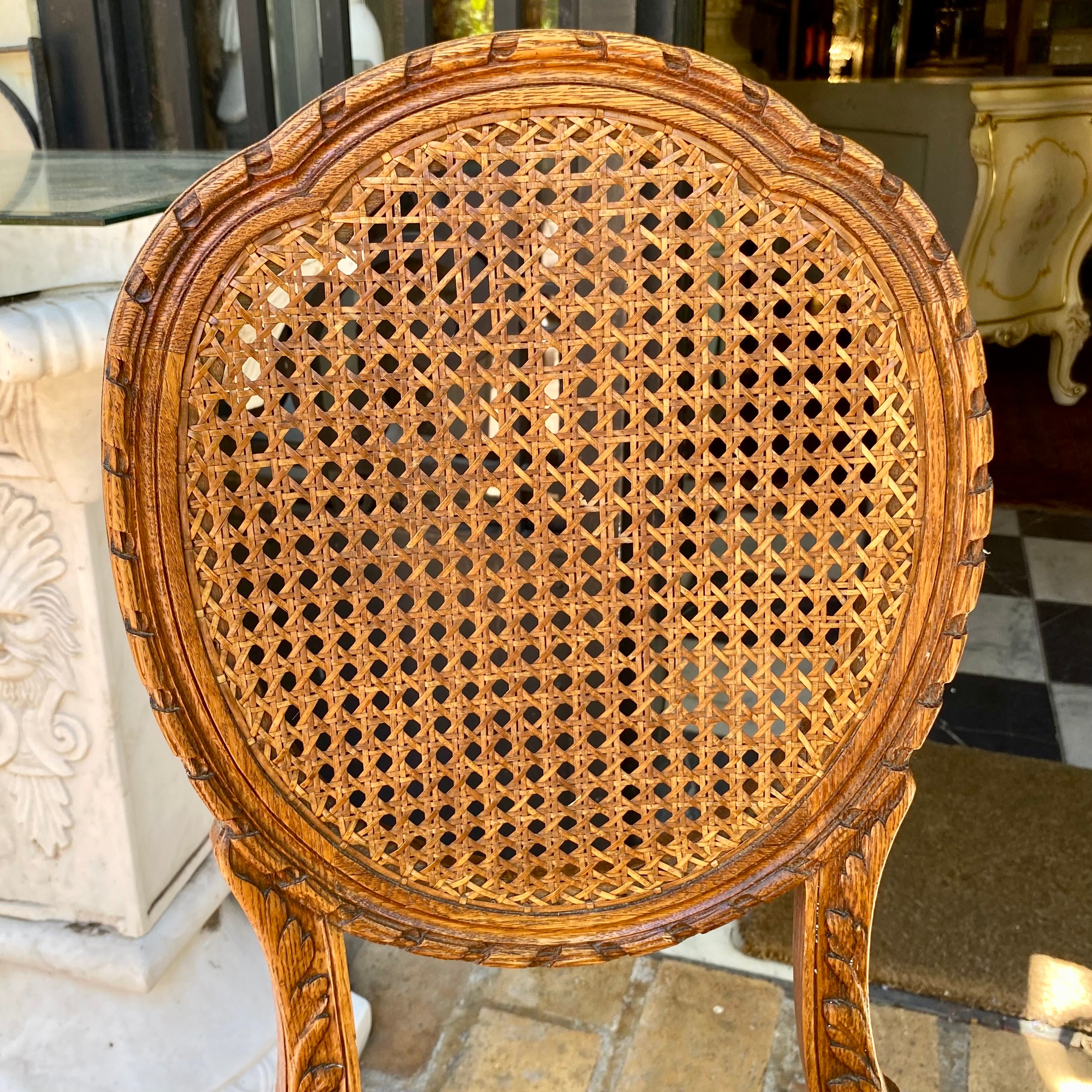 Pair of Antique Carved Oak and Rattan Chairs