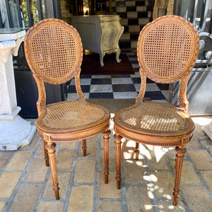 Pair of Antique Carved Oak and Rattan Chairs