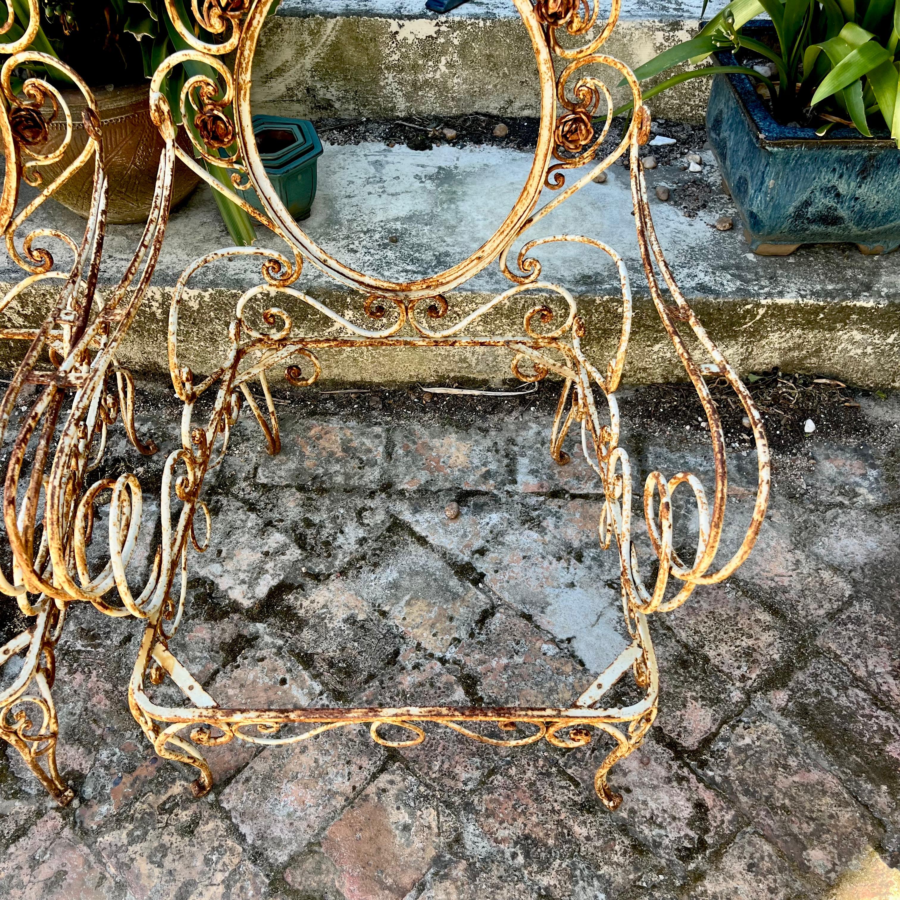 Ornate Wrought Iron Scrollwork Garden Armchairs