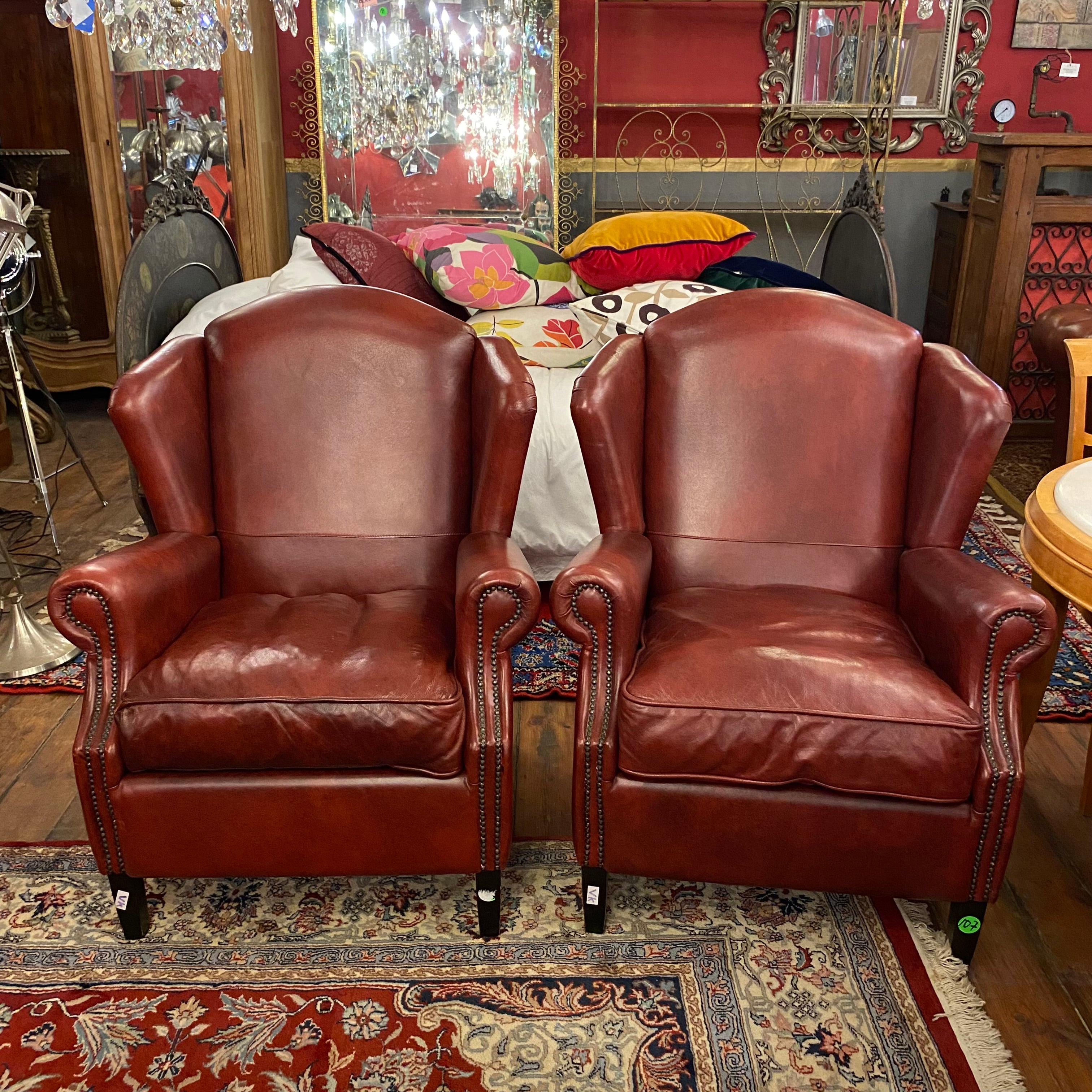 Pair of Burgundy Leather Wingback Armchairs