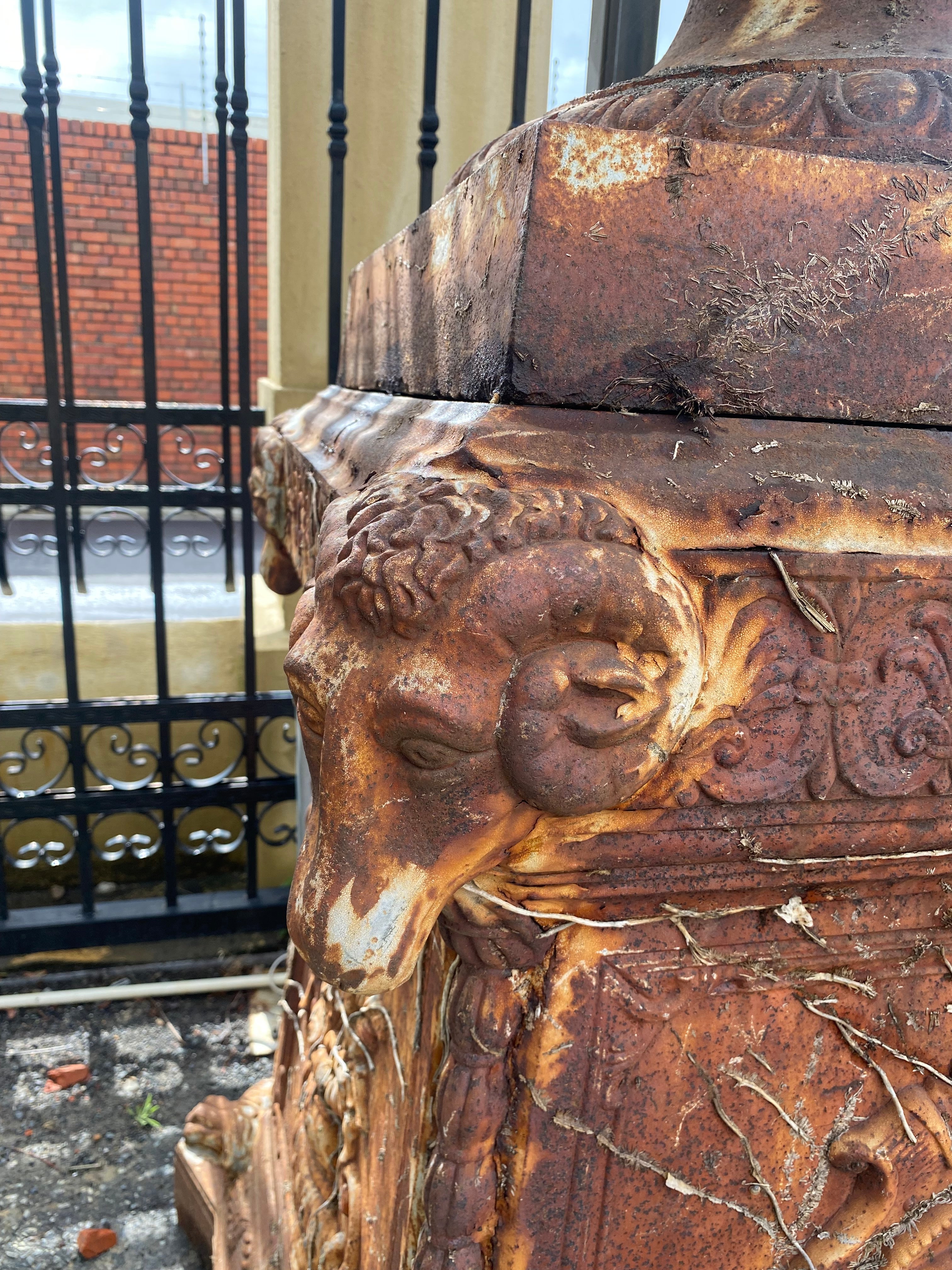 Pair of Magnificent Antique Cast Iron Urns with Plinths