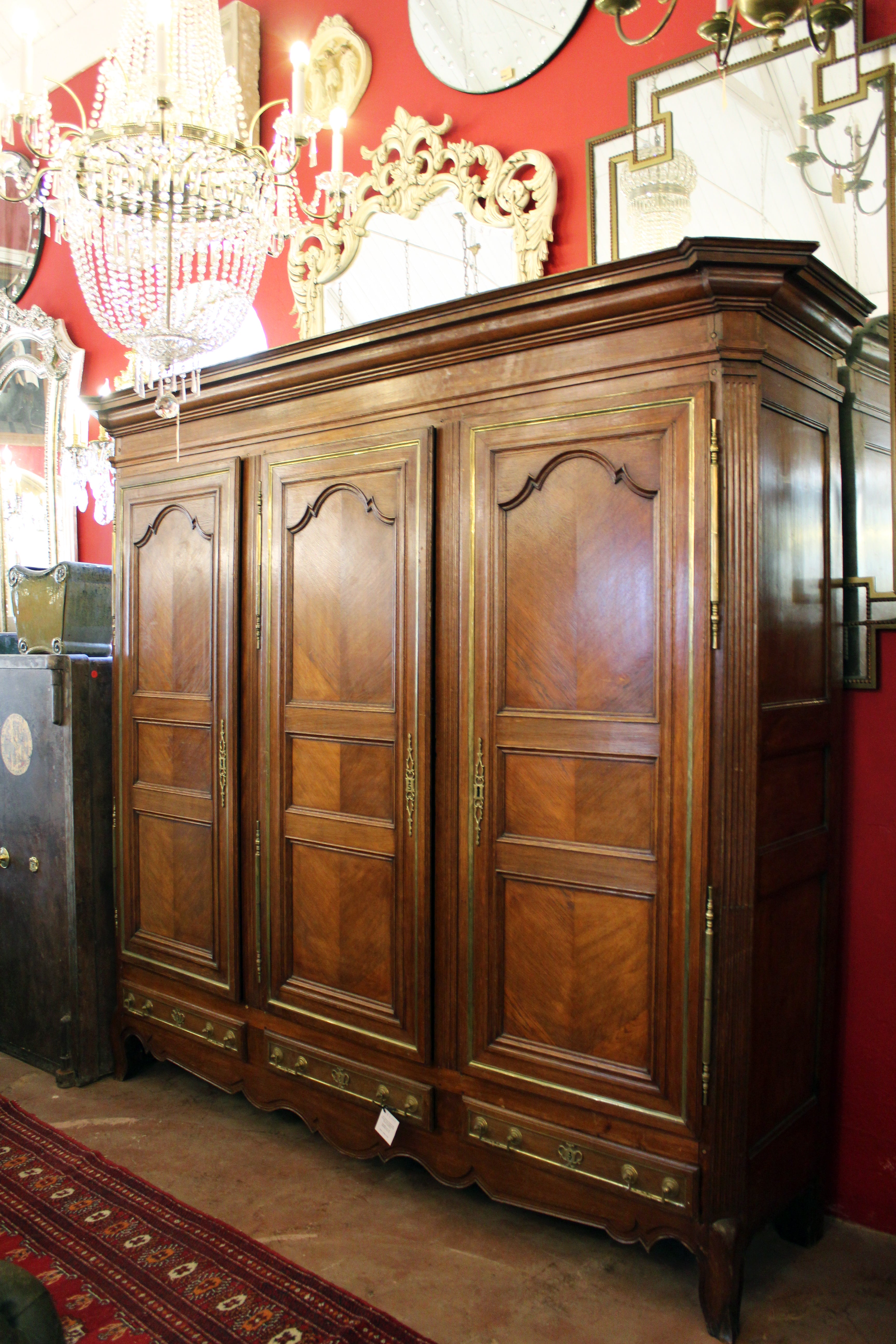 18th Century French Oak Armoire with Magnificent Brass Detailing