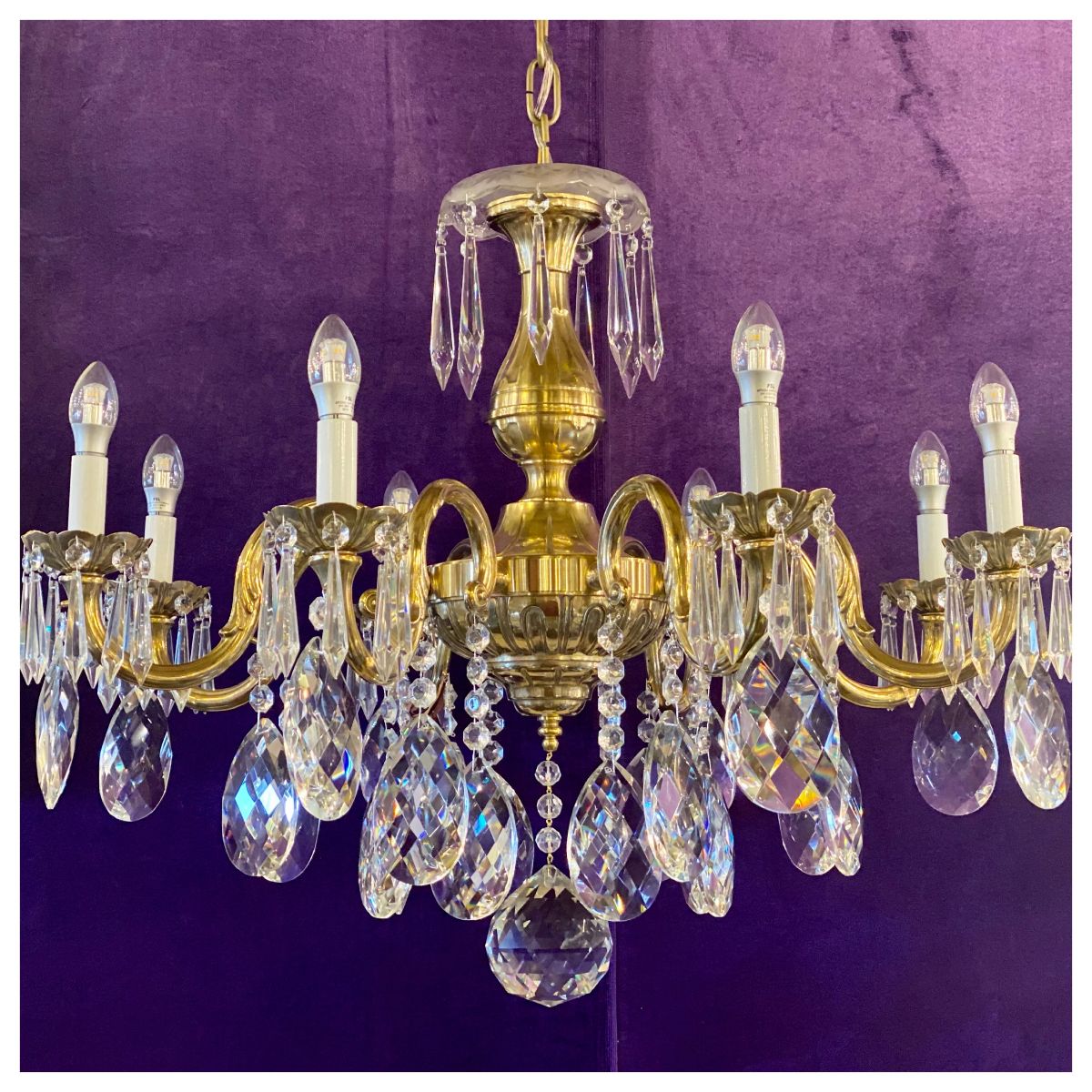 An Antique Polished Brass Chandelier with Crystal