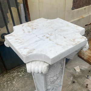 White Marble Plinths with Face of Zeus