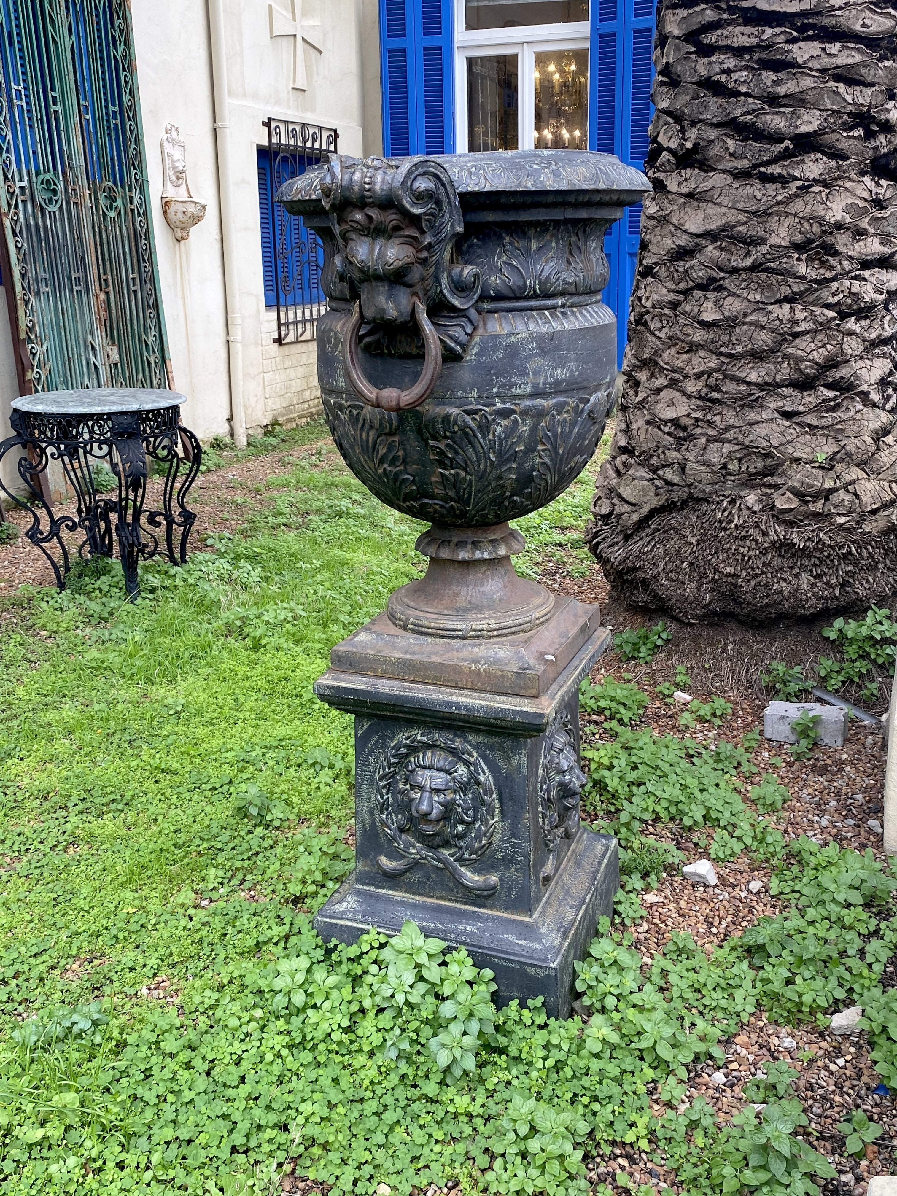 Cast Iron Urn on Plinth with Lion's Face