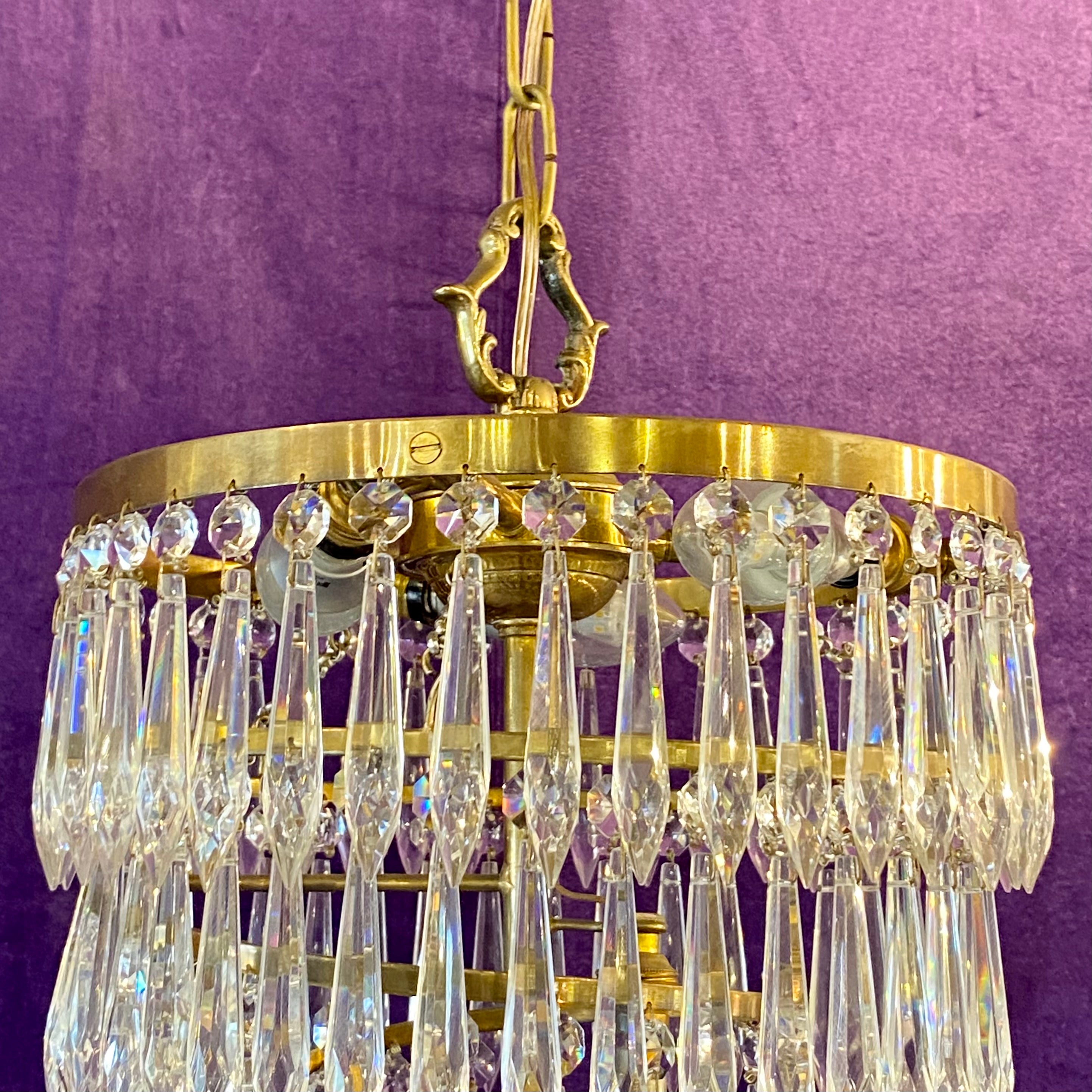 Cascading Brass and Crystal Waterfall Chandelier