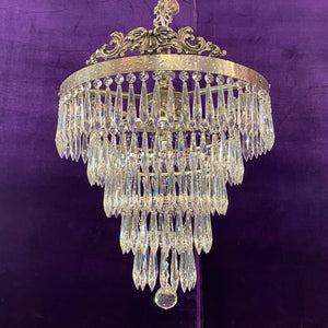 A Nickel and Crystal Waterfall Chandelier