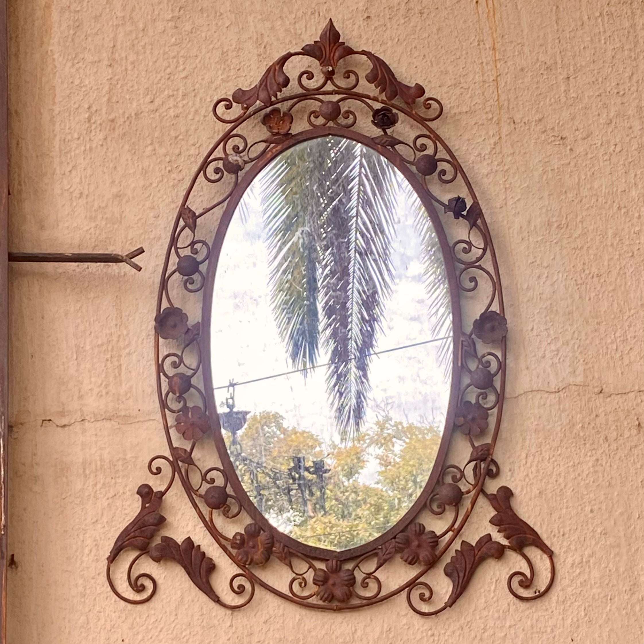 A Rusted Wrought Iron Mirror