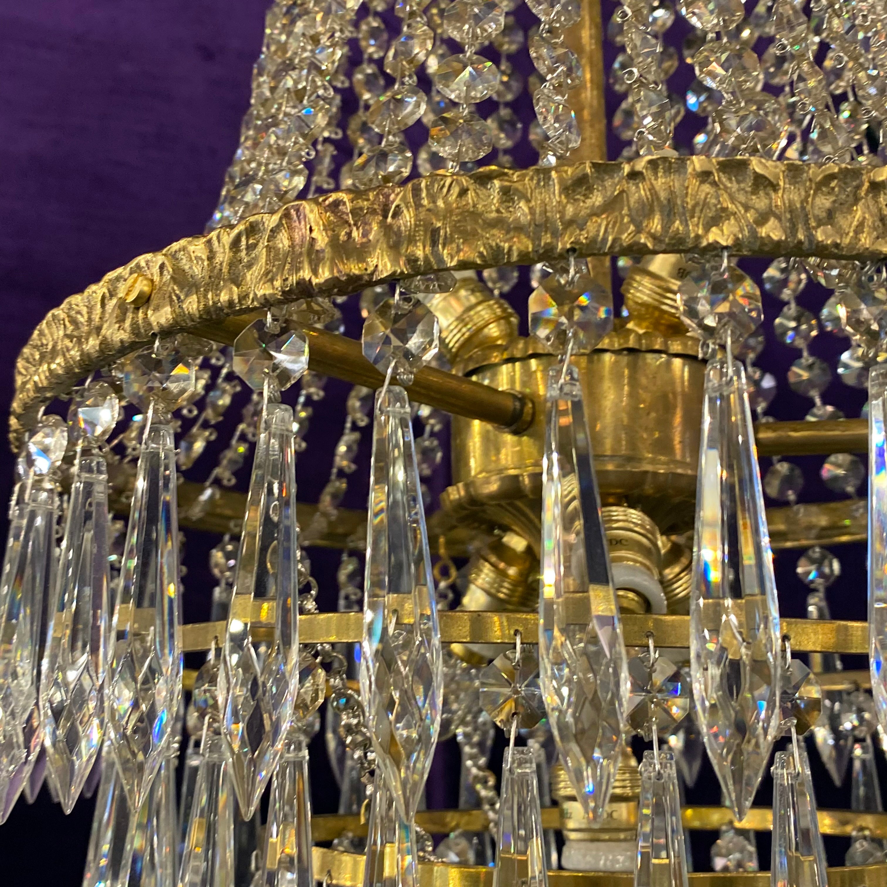 Aged Brass and Crystal Neoclassical Chandelier